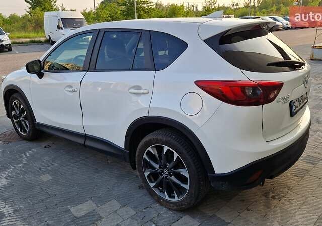 Белый Мазда СХ-5, объемом двигателя 2.49 л и пробегом 70 тыс. км за 15500 $, фото 4 на Automoto.ua