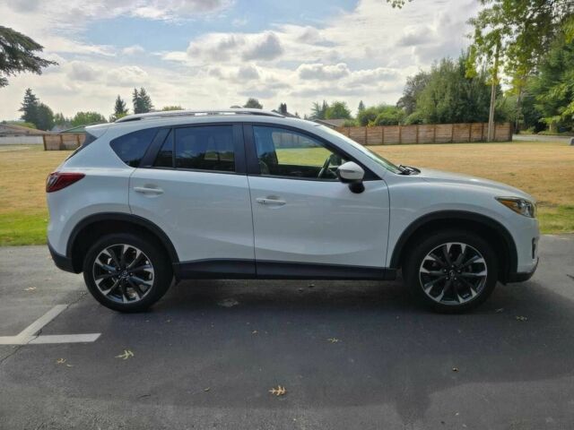 Білий Мазда СХ-5, об'ємом двигуна 2.5 л та пробігом 87 тис. км за 3200 $, фото 5 на Automoto.ua