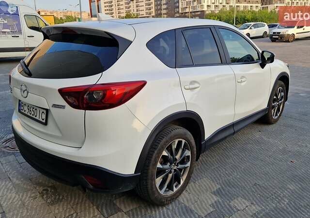 Белый Мазда СХ-5, объемом двигателя 2.49 л и пробегом 70 тыс. км за 15500 $, фото 5 на Automoto.ua