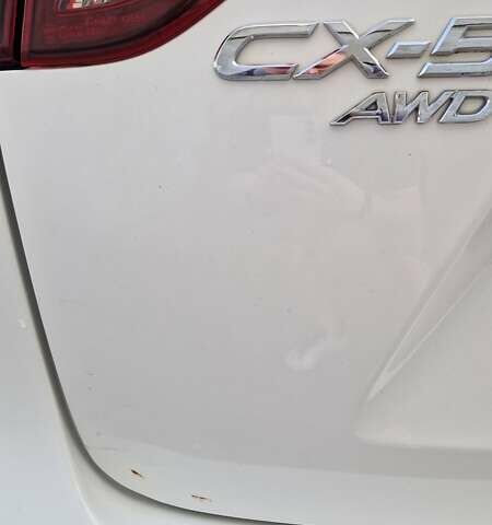 Белый Мазда СХ-5, объемом двигателя 2.49 л и пробегом 70 тыс. км за 15500 $, фото 29 на Automoto.ua