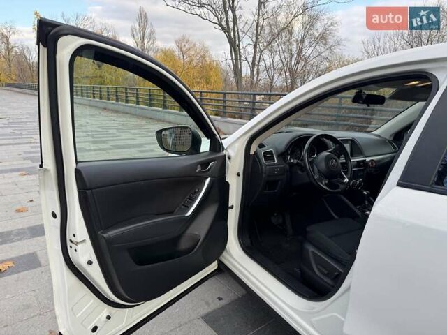 Білий Мазда СХ-5, об'ємом двигуна 2.49 л та пробігом 77 тис. км за 15500 $, фото 18 на Automoto.ua