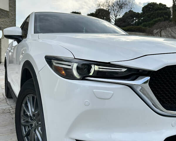 Білий Мазда СХ-5, об'ємом двигуна 2.49 л та пробігом 130 тис. км за 17000 $, фото 4 на Automoto.ua