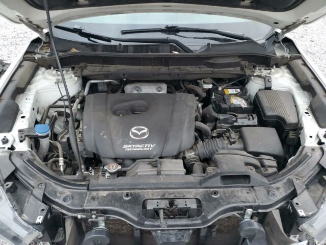 Белый Мазда СХ-5, объемом двигателя 2.5 л и пробегом 127 тыс. км за 15500 $, фото 11 на Automoto.ua