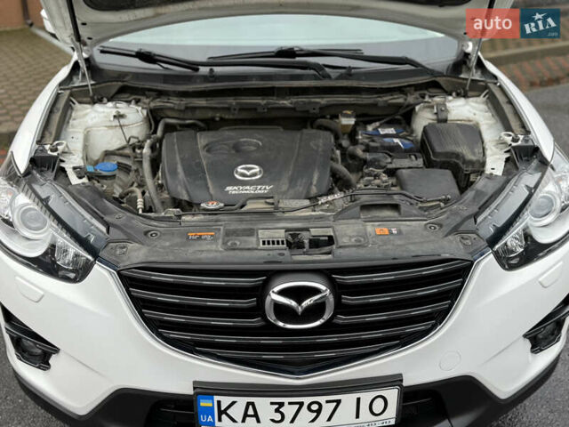 Белый Мазда СХ-5, объемом двигателя 2 л и пробегом 95 тыс. км за 17600 $, фото 69 на Automoto.ua