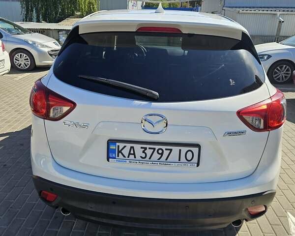 Білий Мазда СХ-5, об'ємом двигуна 2 л та пробігом 94 тис. км за 18999 $, фото 4 на Automoto.ua