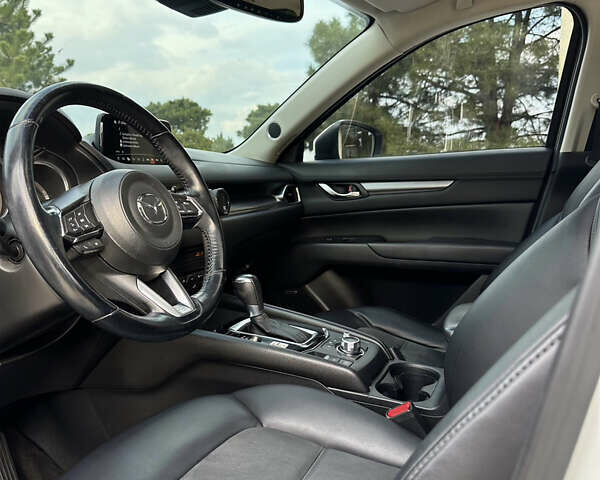 Білий Мазда СХ-5, об'ємом двигуна 2.49 л та пробігом 130 тис. км за 17000 $, фото 12 на Automoto.ua