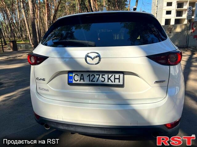 Белый Мазда СХ-5, объемом двигателя 2.5 л и пробегом 144 тыс. км за 17300 $, фото 1 на Automoto.ua