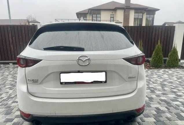 Білий Мазда СХ-5, об'ємом двигуна 2 л та пробігом 104 тис. км за 15000 $, фото 4 на Automoto.ua