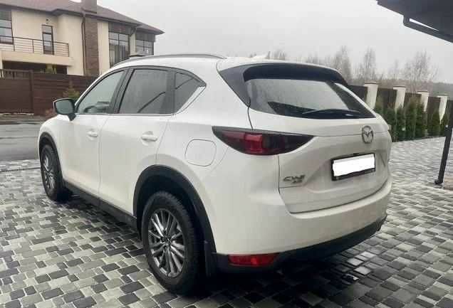 Білий Мазда СХ-5, об'ємом двигуна 2 л та пробігом 104 тис. км за 15000 $, фото 5 на Automoto.ua