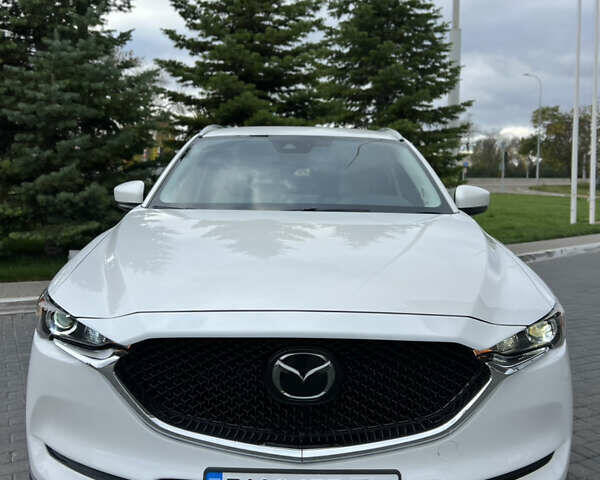 Белый Мазда СХ-5, объемом двигателя 2.5 л и пробегом 57 тыс. км за 18500 $, фото 2 на Automoto.ua