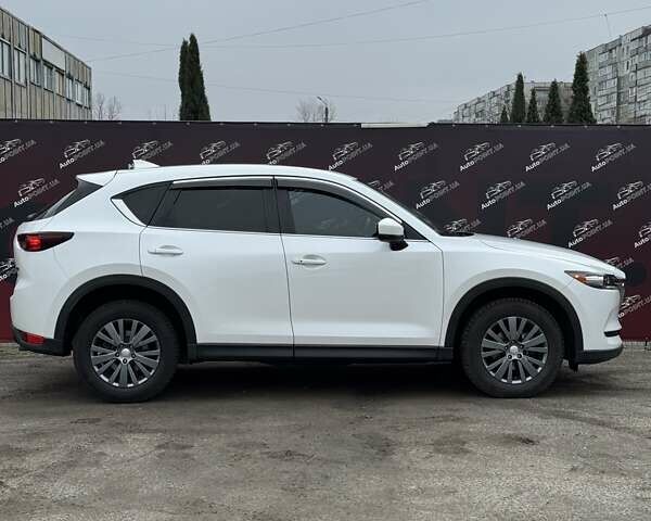 Білий Мазда СХ-5, об'ємом двигуна 2.49 л та пробігом 77 тис. км за 21000 $, фото 4 на Automoto.ua
