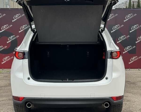 Білий Мазда СХ-5, об'ємом двигуна 2.49 л та пробігом 77 тис. км за 21000 $, фото 13 на Automoto.ua