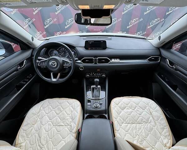 Білий Мазда СХ-5, об'ємом двигуна 2.49 л та пробігом 77 тис. км за 21000 $, фото 26 на Automoto.ua