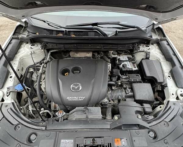 Білий Мазда СХ-5, об'ємом двигуна 2.49 л та пробігом 77 тис. км за 21000 $, фото 34 на Automoto.ua