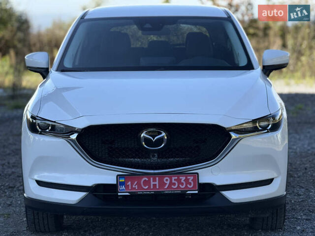 Белый Мазда СХ-5, объемом двигателя 2.5 л и пробегом 128 тыс. км за 20000 $, фото 2 на Automoto.ua