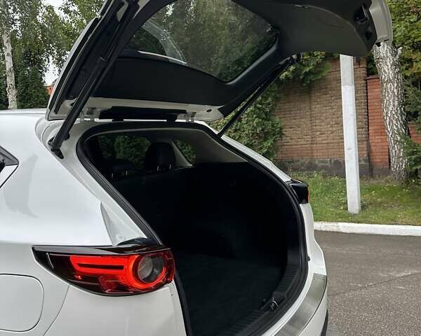 Білий Мазда СХ-5, об'ємом двигуна 2.49 л та пробігом 97 тис. км за 24000 $, фото 64 на Automoto.ua