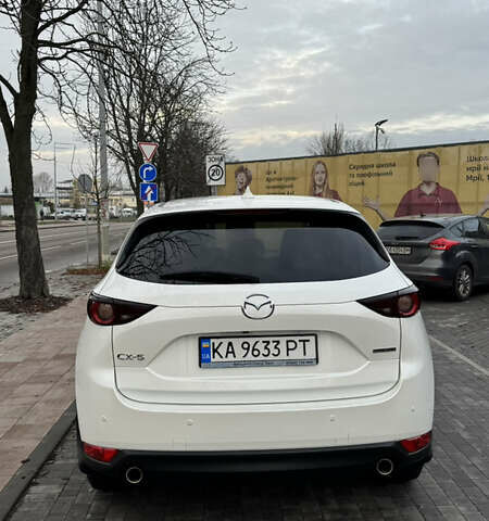 Білий Мазда СХ-5, об'ємом двигуна 2 л та пробігом 55 тис. км за 26000 $, фото 4 на Automoto.ua