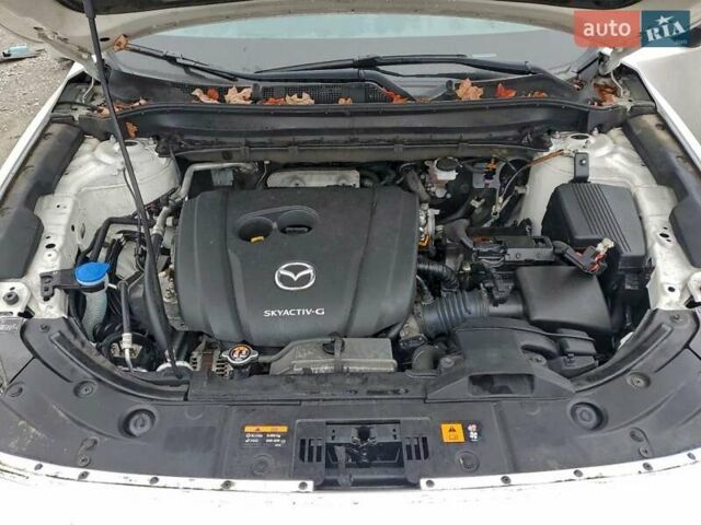 Белый Мазда СХ-5, объемом двигателя 2.49 л и пробегом 101 тыс. км за 5100 $, фото 11 на Automoto.ua