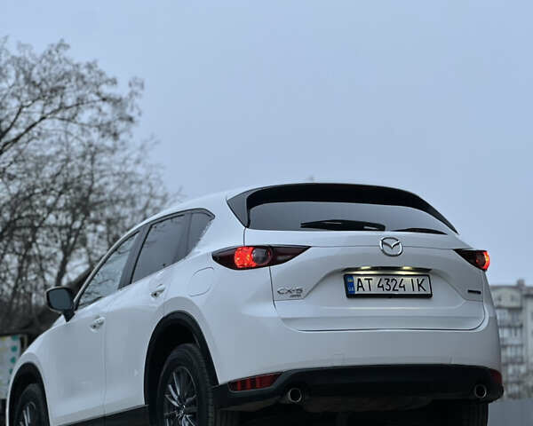 Білий Мазда СХ-5, об'ємом двигуна 2.49 л та пробігом 153 тис. км за 18999 $, фото 12 на Automoto.ua