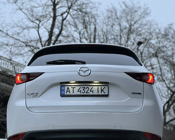 Білий Мазда СХ-5, об'ємом двигуна 2.49 л та пробігом 153 тис. км за 18999 $, фото 14 на Automoto.ua