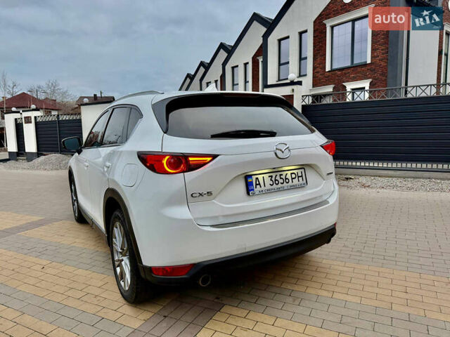 Белый Мазда СХ-5, объемом двигателя 2.49 л и пробегом 70 тыс. км за 23000 $, фото 3 на Automoto.ua