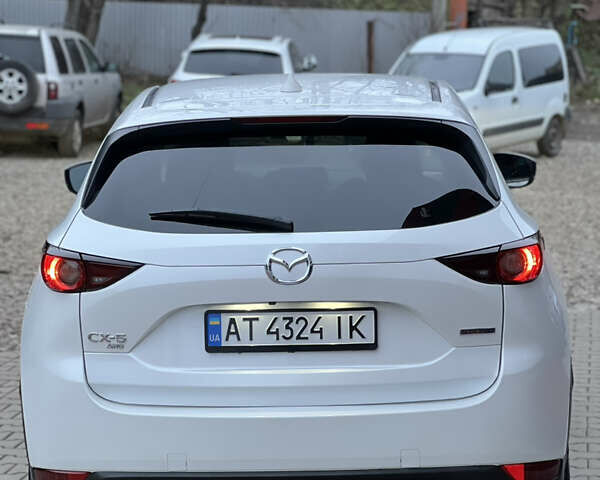 Білий Мазда СХ-5, об'ємом двигуна 2.49 л та пробігом 153 тис. км за 18999 $, фото 13 на Automoto.ua