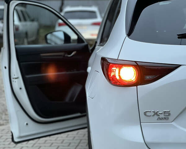Білий Мазда СХ-5, об'ємом двигуна 2.49 л та пробігом 153 тис. км за 18999 $, фото 17 на Automoto.ua