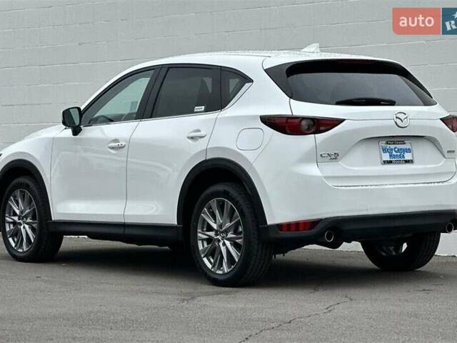 Белый Мазда СХ-5, объемом двигателя 2.49 л и пробегом 58 тыс. км за 11300 $, фото 6 на Automoto.ua