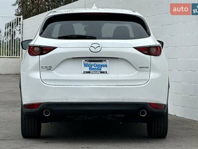 Белый Мазда СХ-5, объемом двигателя 2.49 л и пробегом 58 тыс. км за 11300 $, фото 5 на Automoto.ua