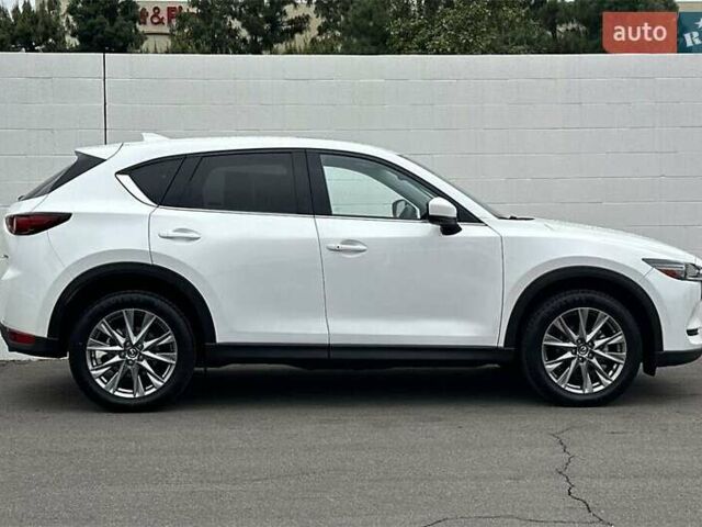 Белый Мазда СХ-5, объемом двигателя 2.49 л и пробегом 58 тыс. км за 11300 $, фото 3 на Automoto.ua