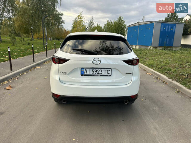 Белый Мазда СХ-5, объемом двигателя 2.49 л и пробегом 80 тыс. км за 22900 $, фото 4 на Automoto.ua