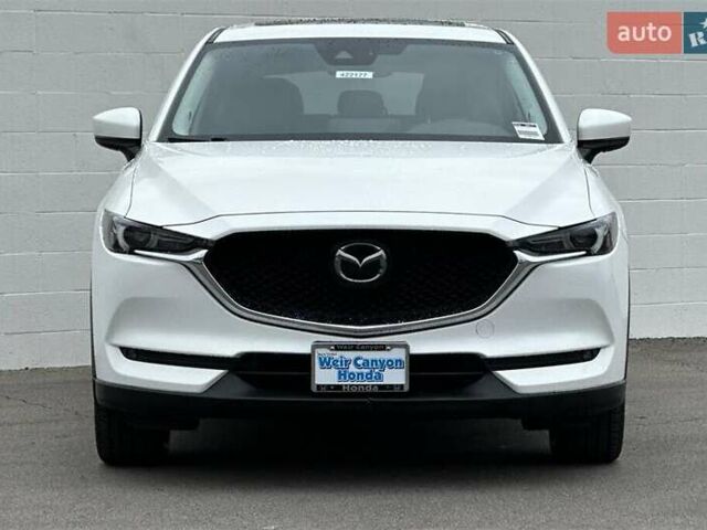 Белый Мазда СХ-5, объемом двигателя 2.49 л и пробегом 58 тыс. км за 11300 $, фото 1 на Automoto.ua