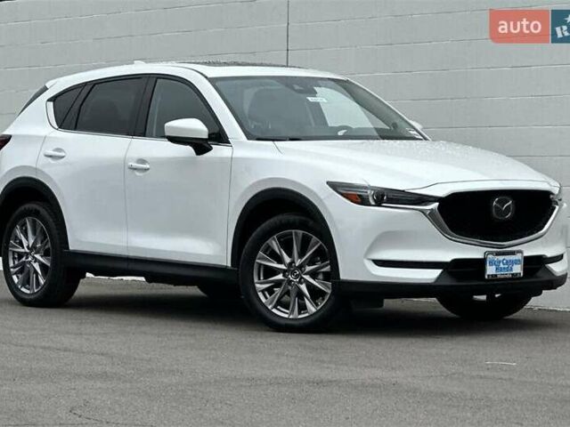 Белый Мазда СХ-5, объемом двигателя 2.49 л и пробегом 58 тыс. км за 11300 $, фото 2 на Automoto.ua