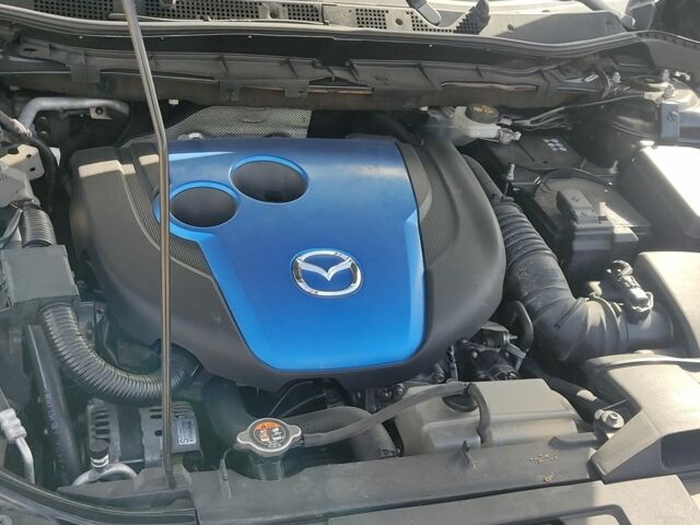 Черный Мазда СХ-5, объемом двигателя 2.2 л и пробегом 165 тыс. км за 12600 $, фото 6 на Automoto.ua