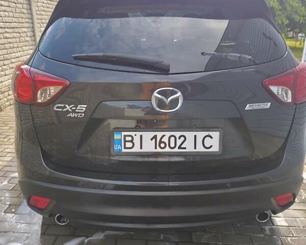 Чорний Мазда СХ-5, об'ємом двигуна 2.19 л та пробігом 242 тис. км за 14000 $, фото 3 на Automoto.ua