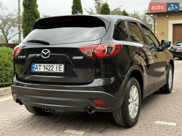 Чорний Мазда СХ-5, об'ємом двигуна 2 л та пробігом 212 тис. км за 10750 $, фото 4 на Automoto.ua