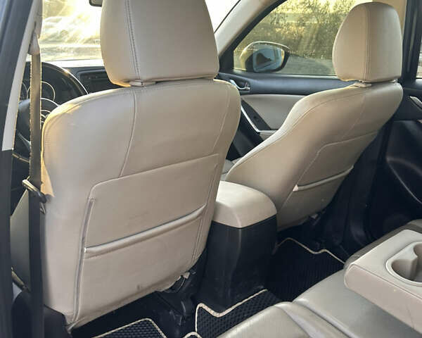 Чорний Мазда СХ-5, об'ємом двигуна 2.2 л та пробігом 267 тис. км за 12000 $, фото 10 на Automoto.ua