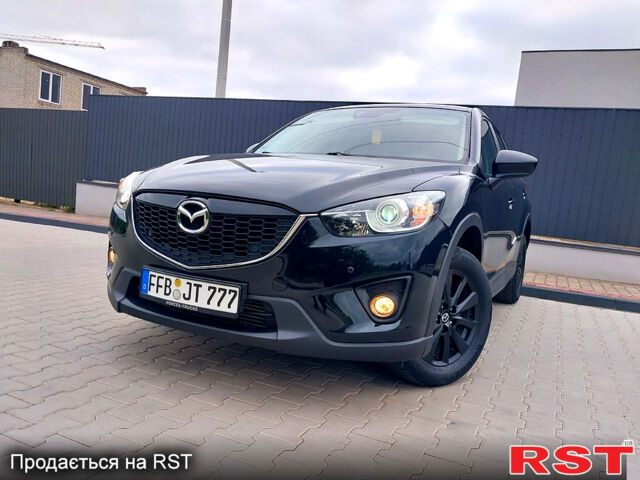 Чорний Мазда СХ-5, об'ємом двигуна 2.2 л та пробігом 209 тис. км за 12750 $, фото 2 на Automoto.ua