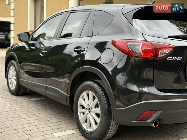 Чорний Мазда СХ-5, об'ємом двигуна 2 л та пробігом 212 тис. км за 10750 $, фото 7 на Automoto.ua