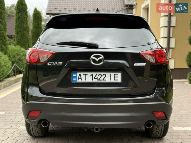 Чорний Мазда СХ-5, об'ємом двигуна 2 л та пробігом 212 тис. км за 10750 $, фото 5 на Automoto.ua