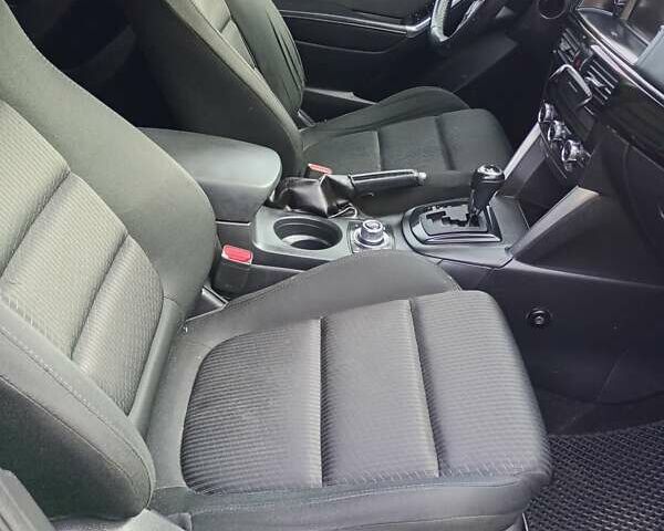 Черный Мазда СХ-5, объемом двигателя 2.19 л и пробегом 278 тыс. км за 12000 $, фото 6 на Automoto.ua