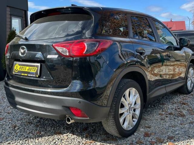 Чорний Мазда СХ-5, об'ємом двигуна 2.2 л та пробігом 225 тис. км за 10999 $, фото 4 на Automoto.ua