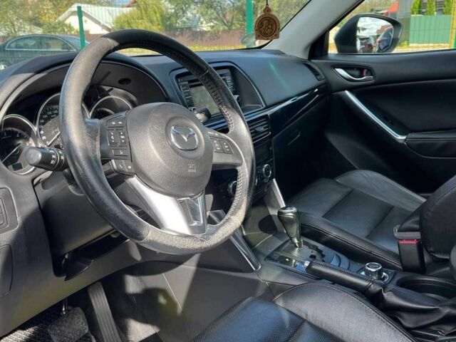 Чорний Мазда СХ-5, об'ємом двигуна 2.2 л та пробігом 225 тис. км за 10999 $, фото 7 на Automoto.ua