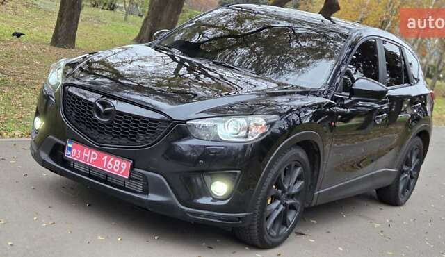 Черный Мазда СХ-5, объемом двигателя 2.2 л и пробегом 150 тыс. км за 16900 $, фото 1 на Automoto.ua