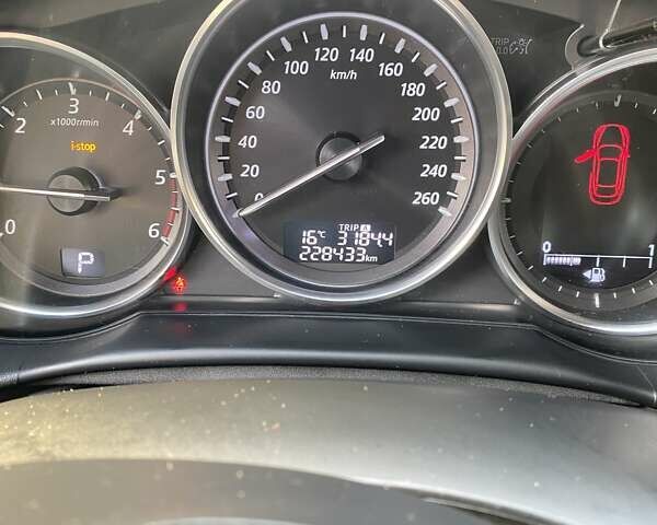 Черный Мазда СХ-5, объемом двигателя 2.2 л и пробегом 230 тыс. км за 14000 $, фото 24 на Automoto.ua