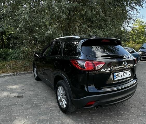 Черный Мазда СХ-5, объемом двигателя 2.4 л и пробегом 145 тыс. км за 12000 $, фото 1 на Automoto.ua