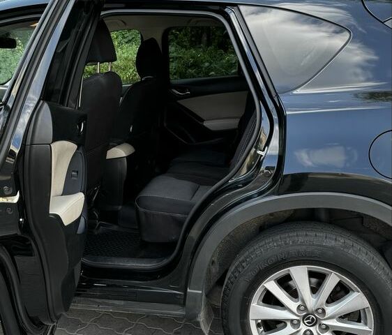 Черный Мазда СХ-5, объемом двигателя 2.4 л и пробегом 145 тыс. км за 12000 $, фото 9 на Automoto.ua