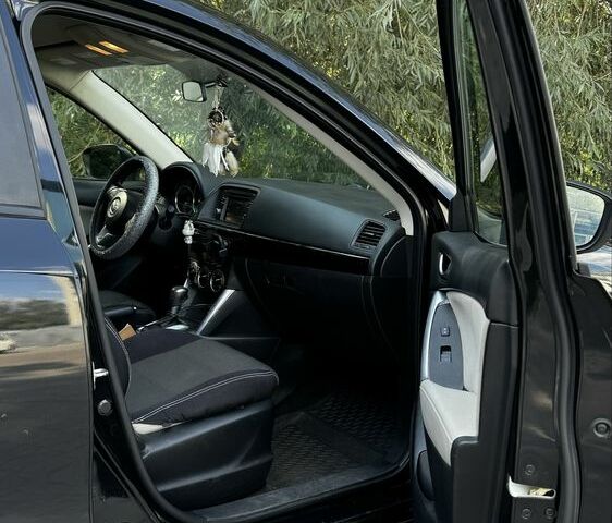 Черный Мазда СХ-5, объемом двигателя 2.4 л и пробегом 145 тыс. км за 12000 $, фото 13 на Automoto.ua