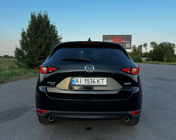Черный Мазда СХ-5, объемом двигателя 2.49 л и пробегом 107 тыс. км за 21300 $, фото 12 на Automoto.ua