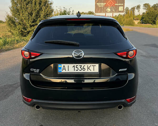 Черный Мазда СХ-5, объемом двигателя 2.49 л и пробегом 107 тыс. км за 21300 $, фото 4 на Automoto.ua